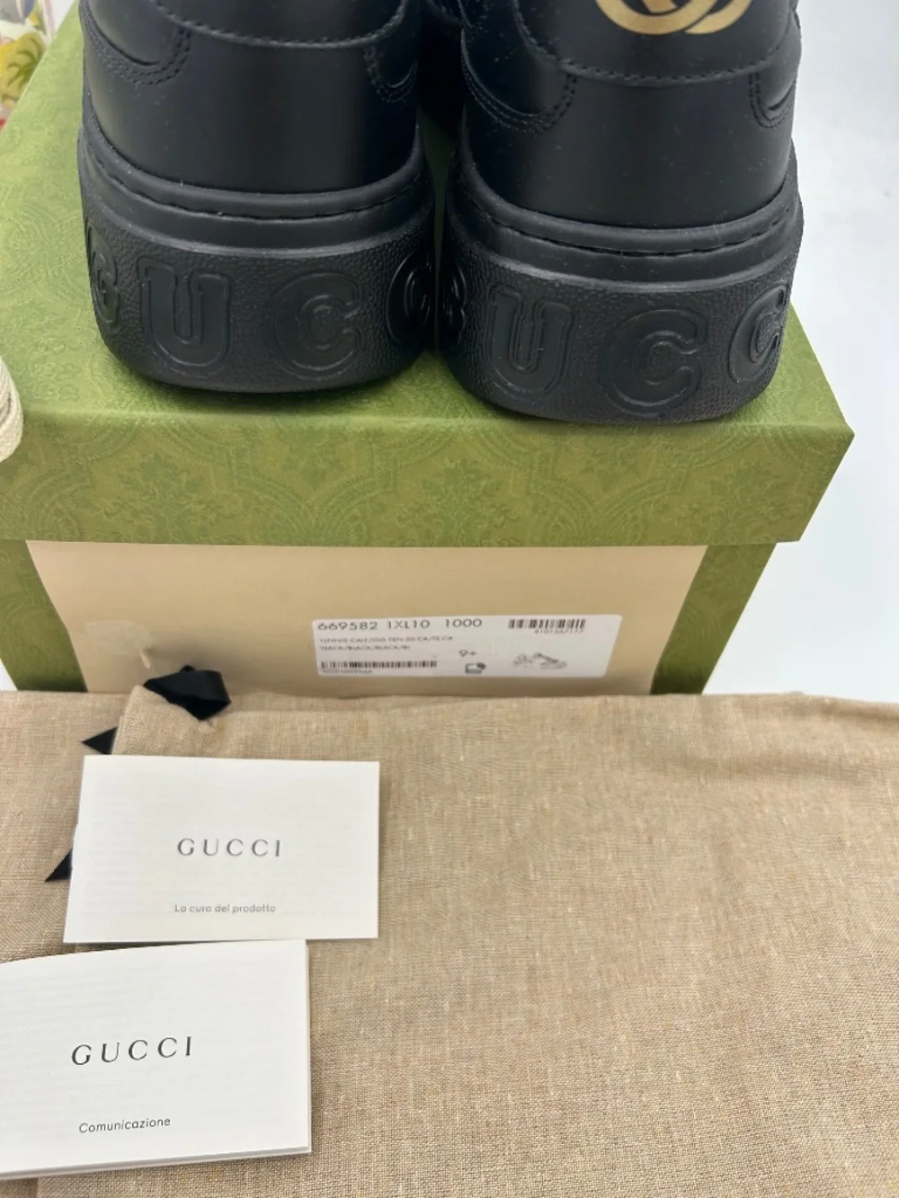 Men’s Gucci GG Embossed Leather Sneakers.  Size 9.5.(fits 10.5). Made in Italy.